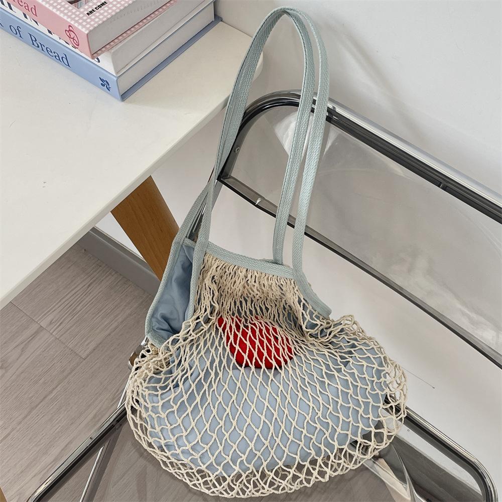 

Summer seaside play net pocket simple niche woven women s bag fashion shoulder bag shopping fishing net bag синій