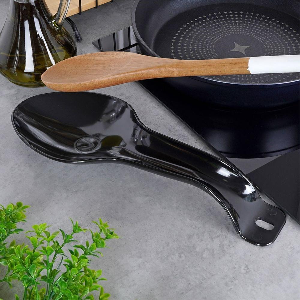 Svart slev- och skedställ