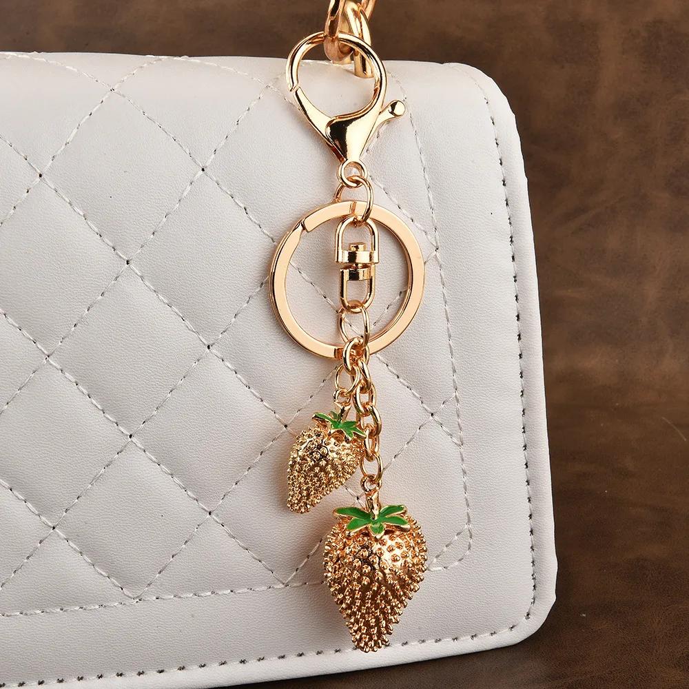 Keychains, bag pendants, fashionable small strawberry fruit ladies' car keychains, cute alloy keychains