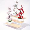 An Artificial Plum Flower Pot for Weddings, Parties, Home Decor - Realistic Floral Arrangements for Hotels, Restaurants, Bars and Wall Decor