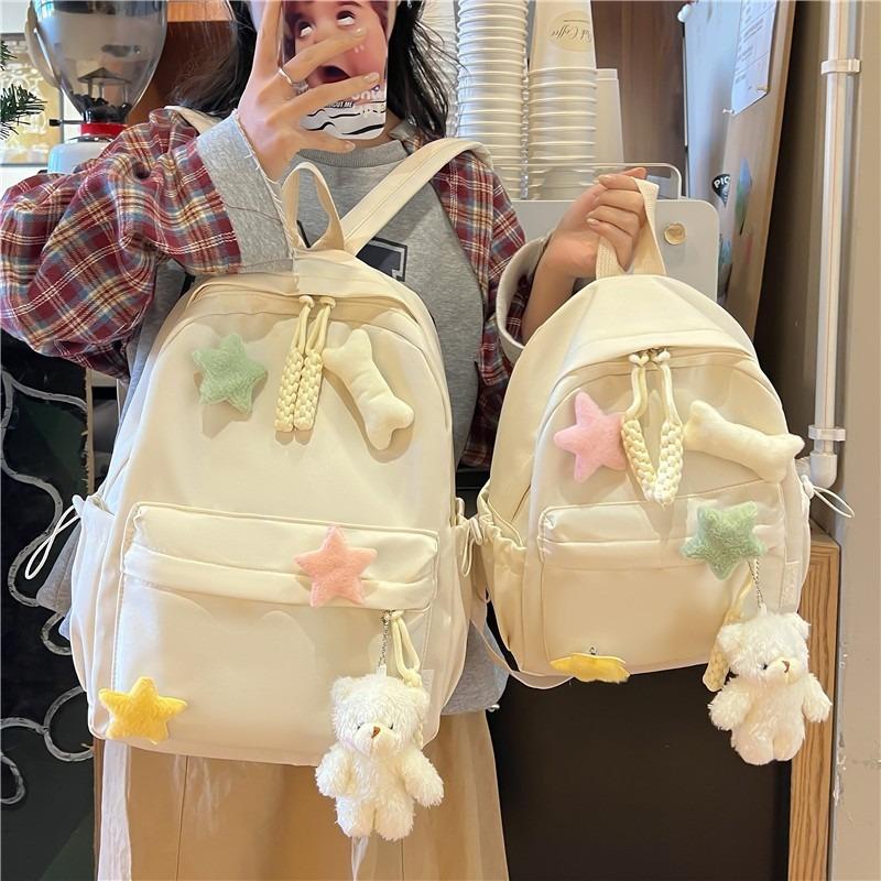 Koreanische Version der neuen süßen Schultasche Mädchen niedliche Sterne Mittelschüler gehen aus kleiner Rucksack große Kapazität Highschool-Rucksack