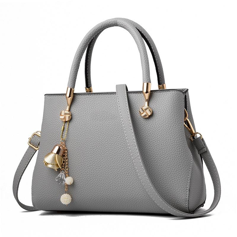 

Large capacity shoulder messenger bag large bag women s autumn new women s bag Korean version versatile atmospheric portable fashion сірий колір