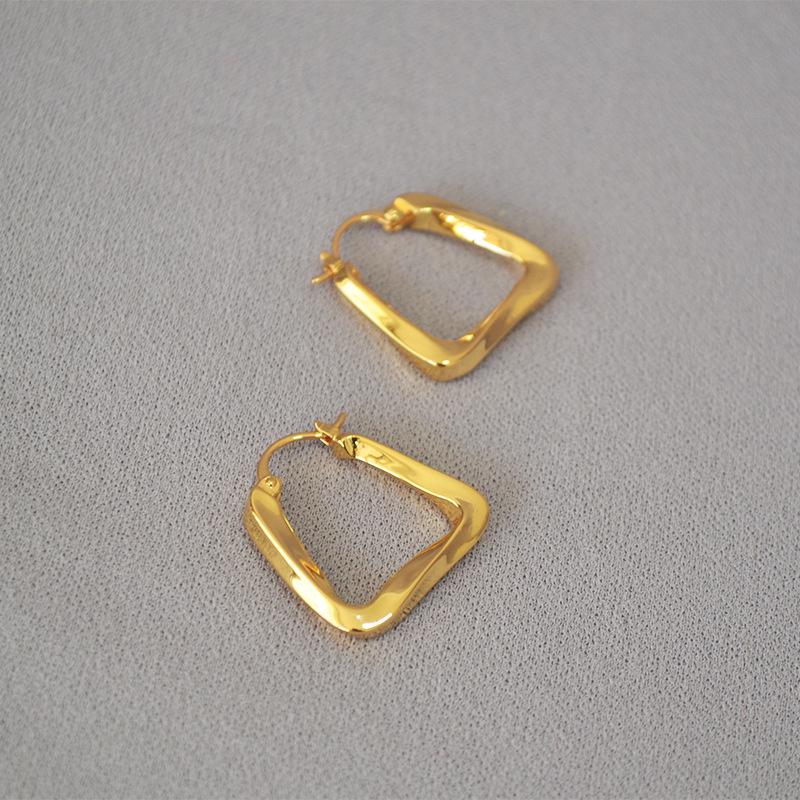 INS Geometric Twisted Metal Triangle Earrings for Women.