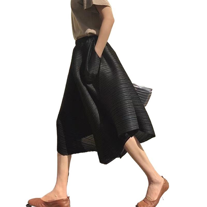 Pleated skirt pants with irregular hem and umbrella shaped loose wide leg pants