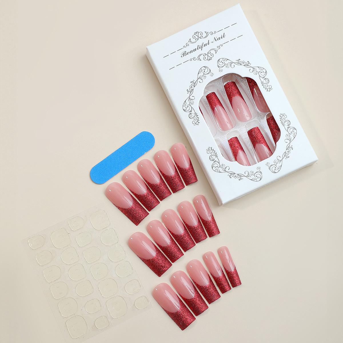 

Накладные ногти ручной работы с французским краем и блестками, очень длинные