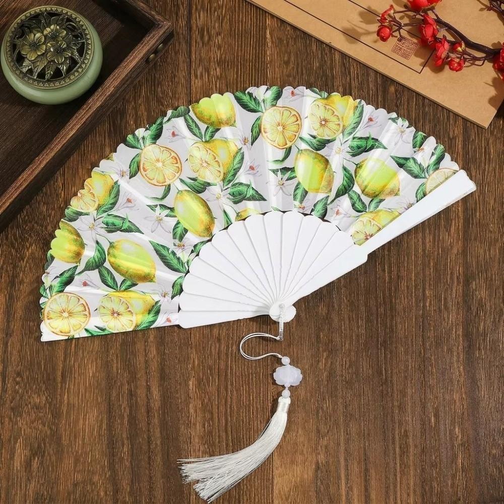 Ventilateur à main motif fruits Design citron Ventilateur portable Tissu décontracté Ventilateur à pompons Femmes