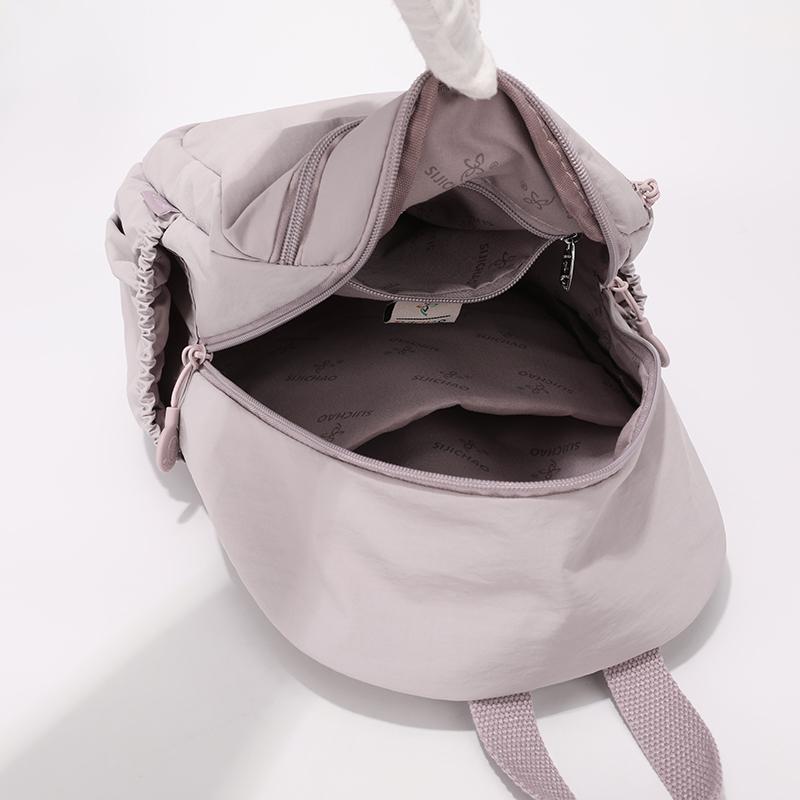 Leichter Nylon-Rucksack mit Reißverschlusstasche vorne Seitentaschen Verstellbare Träger Lässiger Tagesrucksack für Damen für den täglichen Gebrauch und Reisen