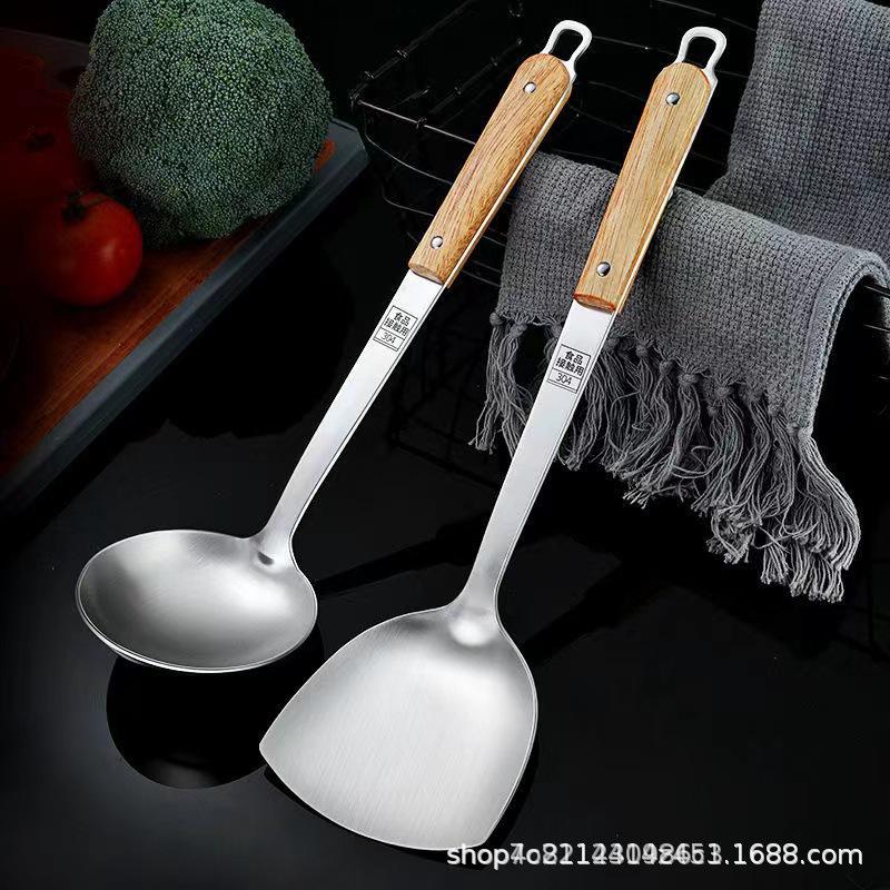 

Набор кухонных принадлежностей из нержавеющей стали с ручкой из цельного дерева: лопатка, ложка для супа, лопатка для жарки и дуршлаг с теплоизоляцией. Solid Wood Handle Colander