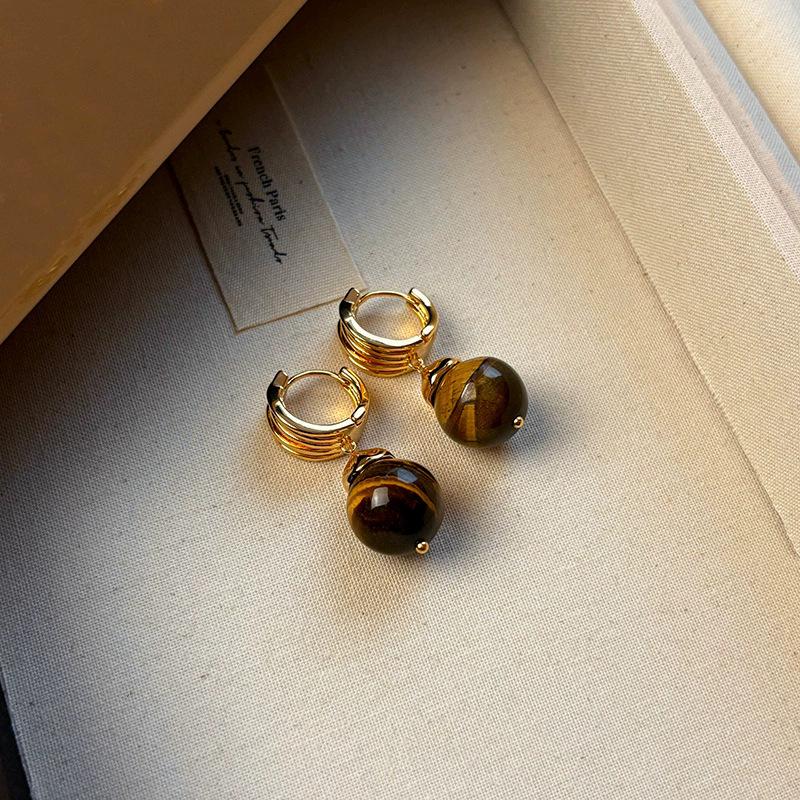 

Maillard tiger s eye stone earrings women s light luxury high-end new unique good-looking ear buckles autumn and winter exaggerated earrings