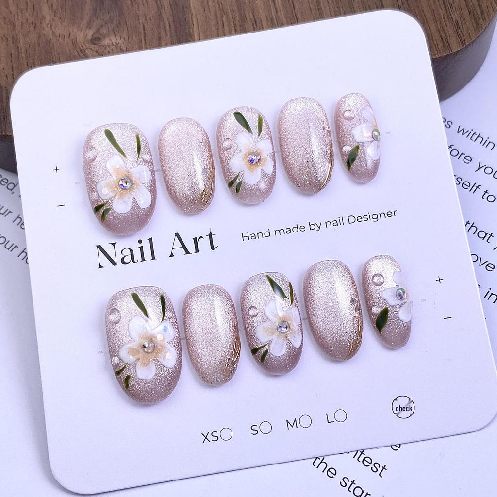 Hot-Selling Hand-Painted Floral Cat Eye Nail Tips - Ice Transparent Nude, Gentle Style Wearable Nails.