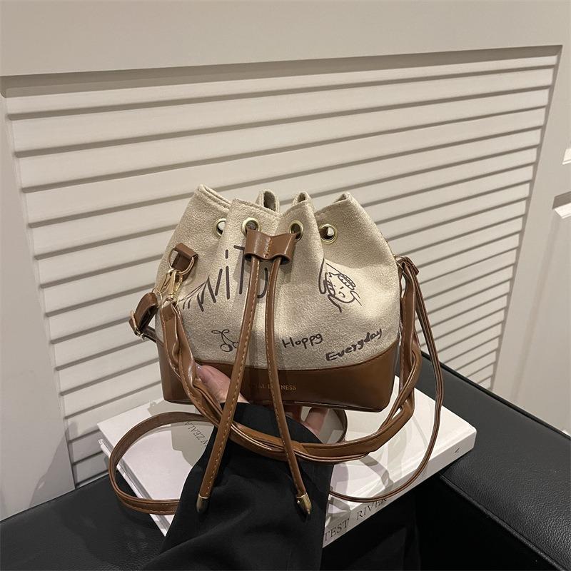 Textured portable bucket bag women's autumn and winter new suede daily commute shoulder bag retro messenger bag
