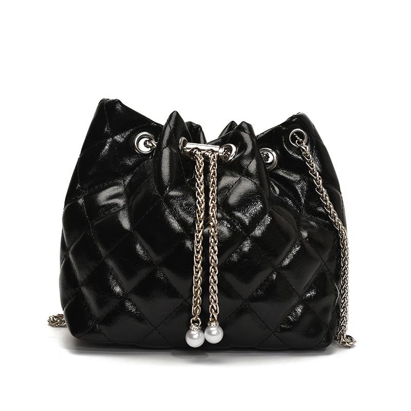 Beliebte Großhandelsnische Freizeit Rautenmuster tragbare plissierte Eimertasche Koreanische Mode vielseitige leichte Luxus Ketten Umhängetasche