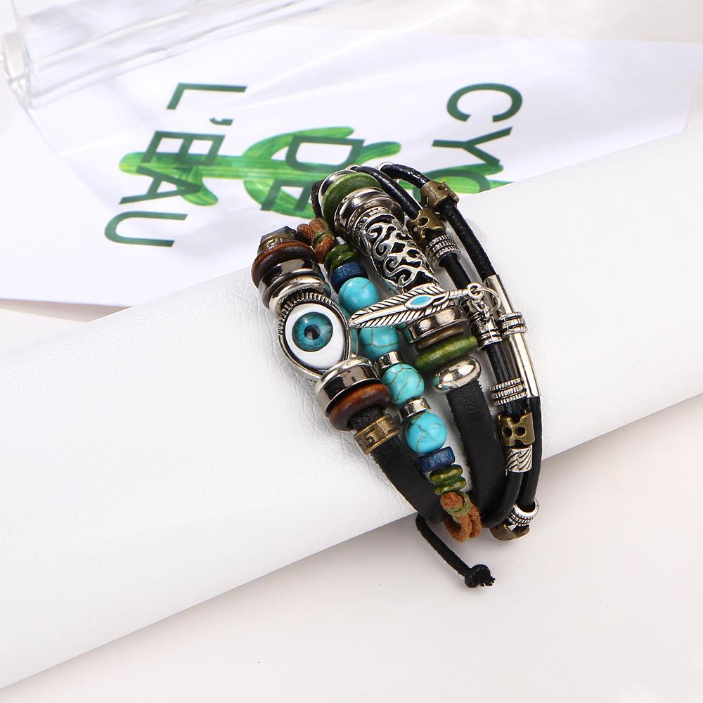 Ethnic Alloy Feather Pendant Cowhide Beaded Woven Bracelet