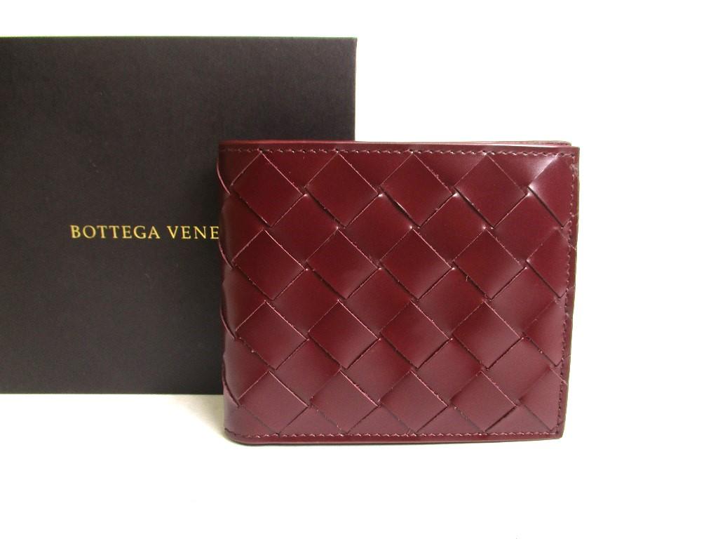 

Автентичний маленький шкіряний гаманець BOTTEGA VENETA Intrecciato Bordeaux із подвійним складенням №454 відремонтований