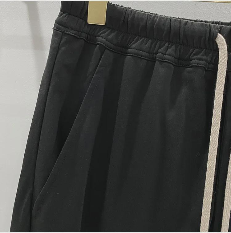 SUBHUMAN Pánská tmavá série: Slonově bílé zkrácené harémové pletené kalhoty - Letní ležérní móda