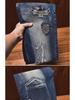 Men's Slim-Fit Embroidered Floral Distressed Jeans with Patches and Elastic Trim.