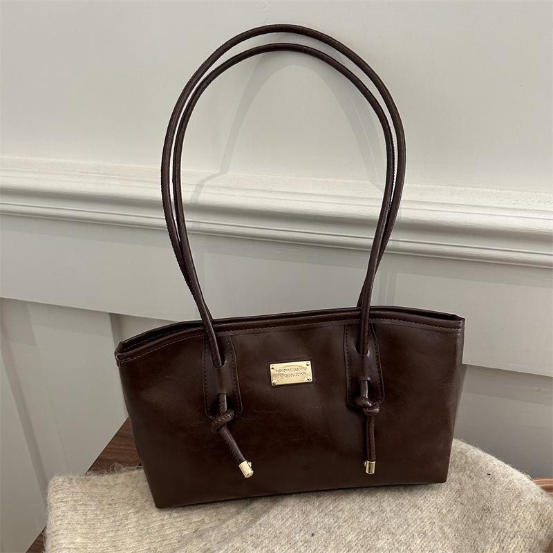 

Текстурная модная сумка подмышку женская новая осенне-зимняя универсальная личность простая однотонная большая вместимость трендовая сумка через плечо для通勤