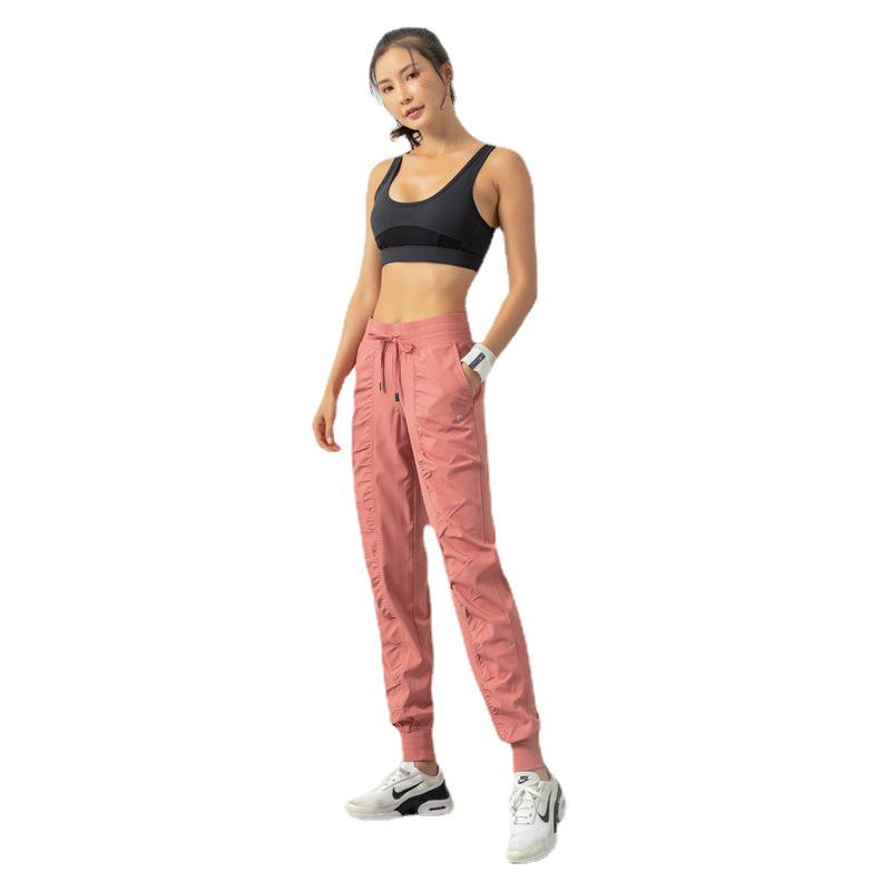 2021 Spring Women's Breathable Loose Fit Nine-Point Running Pants with Pockets