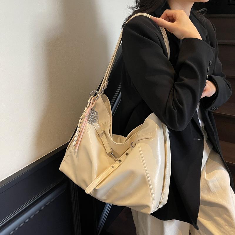 Large-capacity commuter bag women's 2025 new high-end simple and versatile shoulder bag student class messenger bag