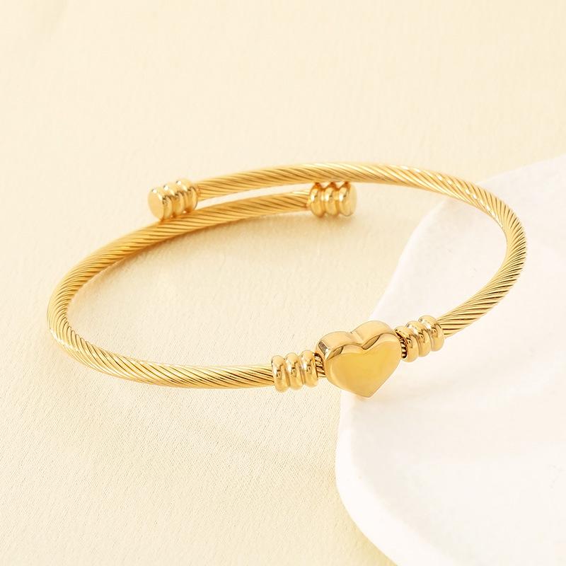 European American Heart-Shaped Open Stainless Steel Bracelet - Silk Rope Cable Wire Design for Women