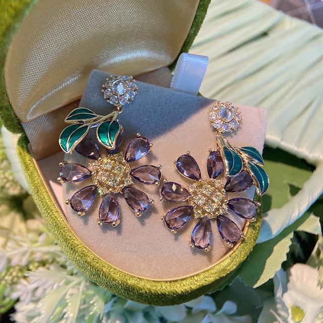 

Ins Net красные серьги женские солнечные цветы блестящие серьги цвет кубического циркония темперамент висячие серьги для женщин фиолетовый