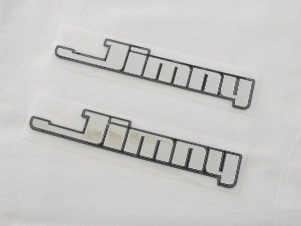 

Suzuki genuine Jimny left and right (SUZUKI Jimny) [Side emblem] [Jimny set] [Material Hiboskull] Compatibility [JB64W] // [XG] [XL] [XC] сірий колір
