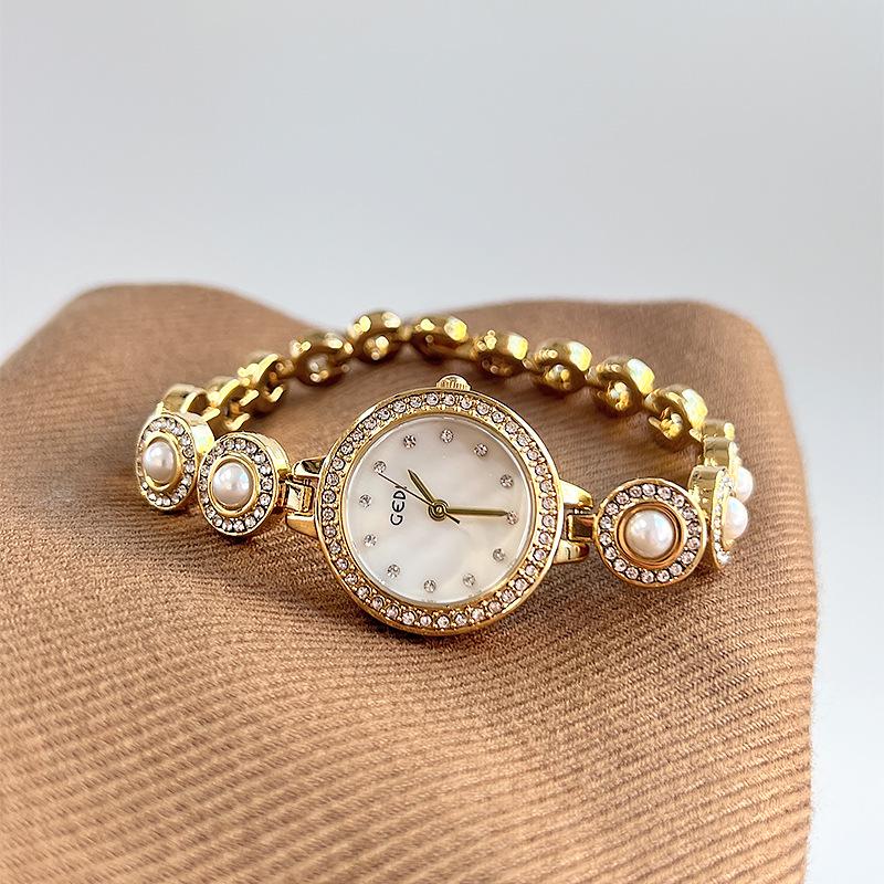 New Chinese Bracelet Watch Niche High Value Light Luxury Bead Women'S Watch High Sense Fritillary Face Quartz Watch