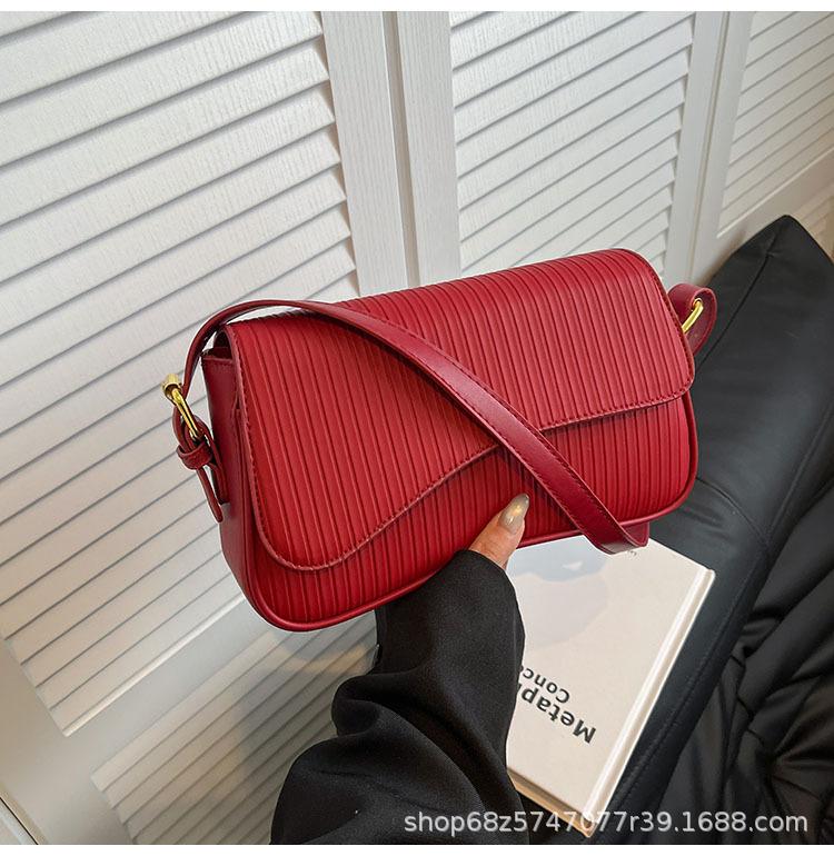 Textured handbag 2025 spring new women's bag niche retro shoulder bag personalized striped crossbody bag trend