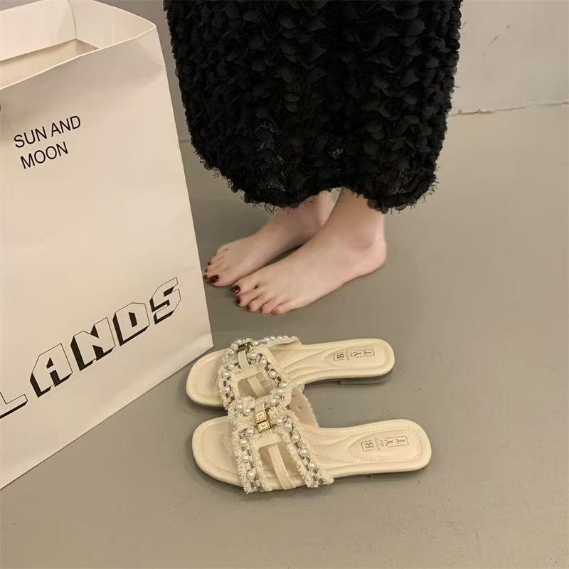 Perle kleiner duftender Wind kühle Hausschuhe Damen Sommerbekleidung 2025 neue flachbodige Fee Strand Ausgehen Ein-Wort kühle Hausschuhe