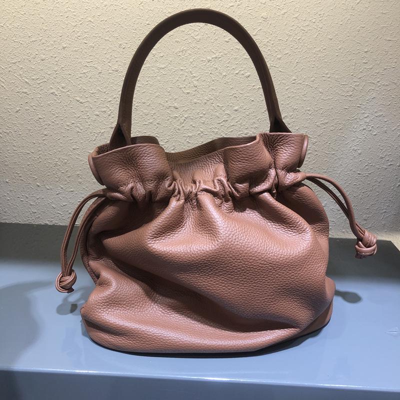 Women's Classic Fold Leather Bucket Bag: New Style, First Layer Cowhide, Trendy Solid Color Handheld Design