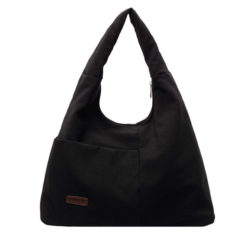 Einfache und große Unterarmtasche Damen einfarbig vielseitige Nischen-Schultertasche Nylon-Textur Pendler-Handtasche