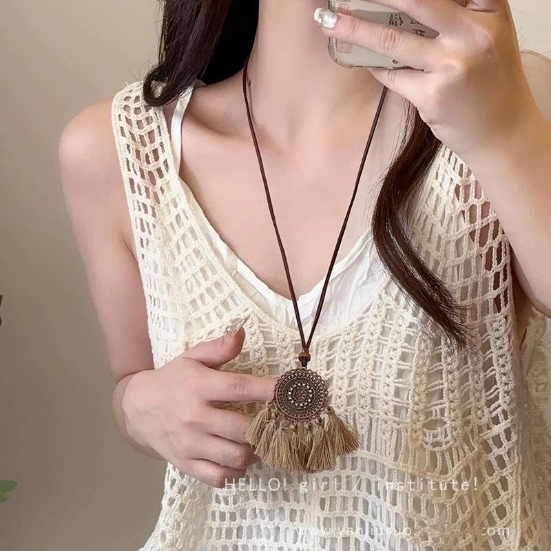 Bohemian Ethnic Style Long Bow Metal Necklace with Vintage Distressed Pendant (2025)