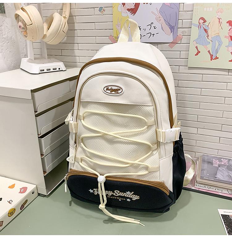 High-value cute primary school student spine care schoolbag female junior high school girl high school student backpack burden reduction