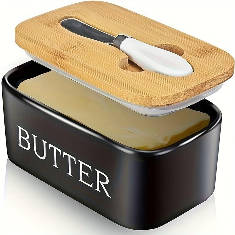 

A covered butter dish, ceramic material to keep the butter, sealed with a knife and high quality silicone, good kitchen gift
