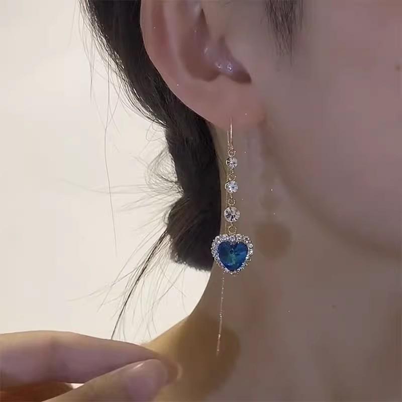 Eleganckie niebieskie kryształowe kolczyki miłosne dla kobiet – długie, luksusowe wzornictwo