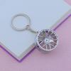 Creative Car Wheel Hub Keychain: Zinc Alloy Metal, Customizable Gift.