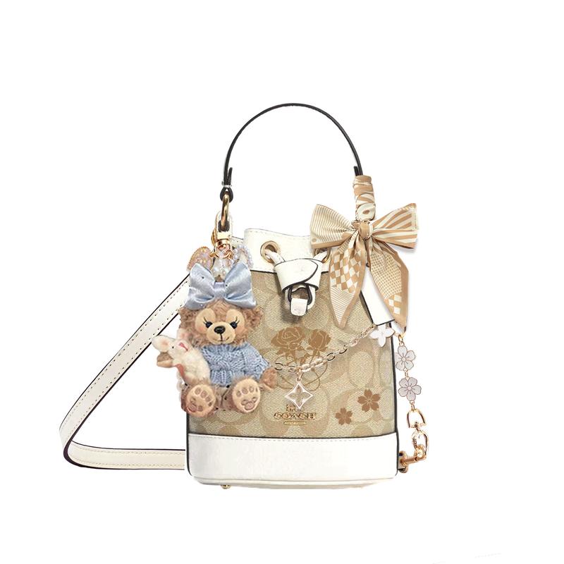 

COACH handbag [Customized bag] Dempsey 15 classic old flower cherry blossom extension detachable shoulder strap bow ribbon doll Blues Bear Basic Model синій