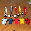 1Pc Silicone Football Jersey Keychains - Sporty Football Match Souvenirs, Boys' Backpack Charms, Car Key Accessories, Ideal Gift for Sports Fans|