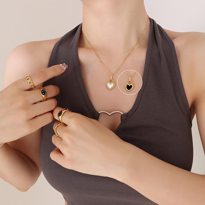 European Geometric Peach Heart Necklace - Double-Sided Light Luxury Design in Gold-Plated Titanium Steel.