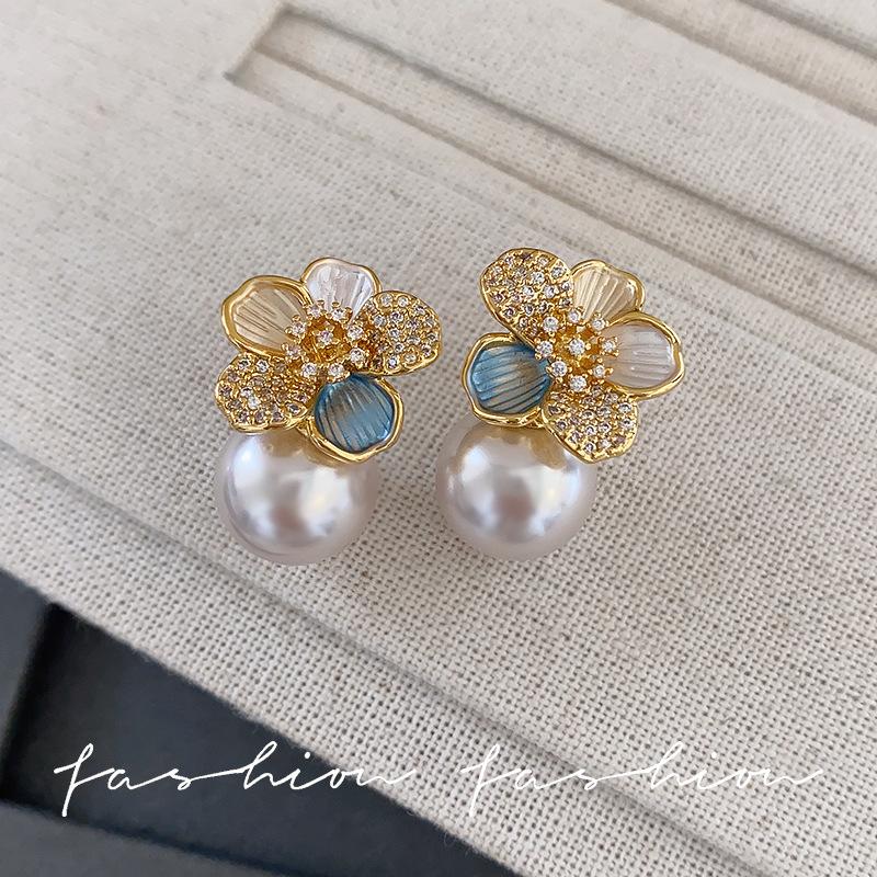 

Light luxury temperament flower glass pearl stud earrings women s niche design high sense A grade zircon earrings French earrings