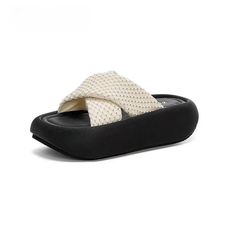 

Thick-bottomed rhinestone cross-strap one-word slippers for women s outer wear 2025 new versatile, comfortable and lightweight non-slip beach slippers 35