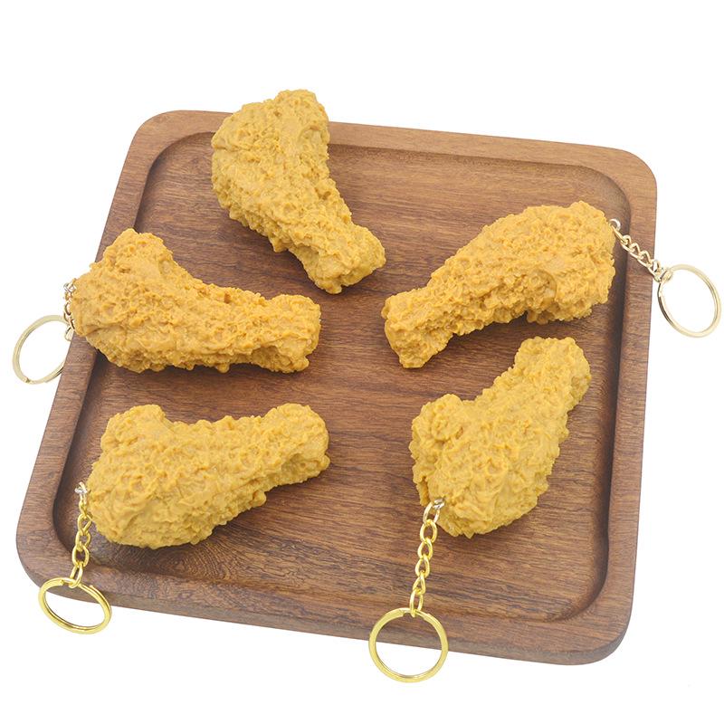 Porte-clés Jouet Modèle de Patte et d'Aile de Poulet en PVC