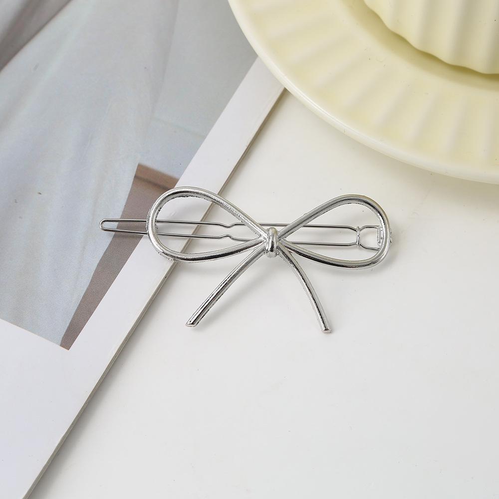 Elegant Smooth Metal Bow Hair Clip - European & American Style Women's Accessory