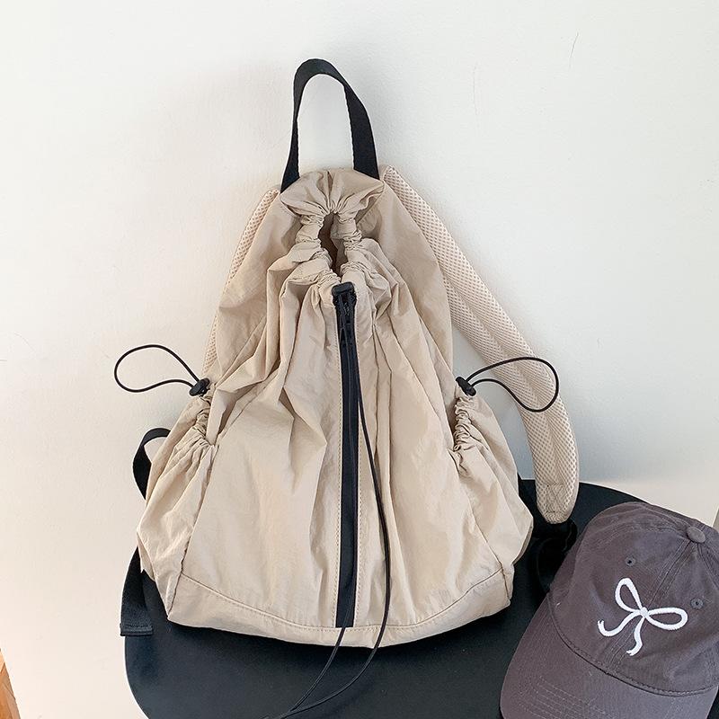 

New Korean Style Drawstring Casual Backpack with A Minimalist and High-end Feel for Women, Multifunctional and Soft Nylon Backpack абрикосовый
