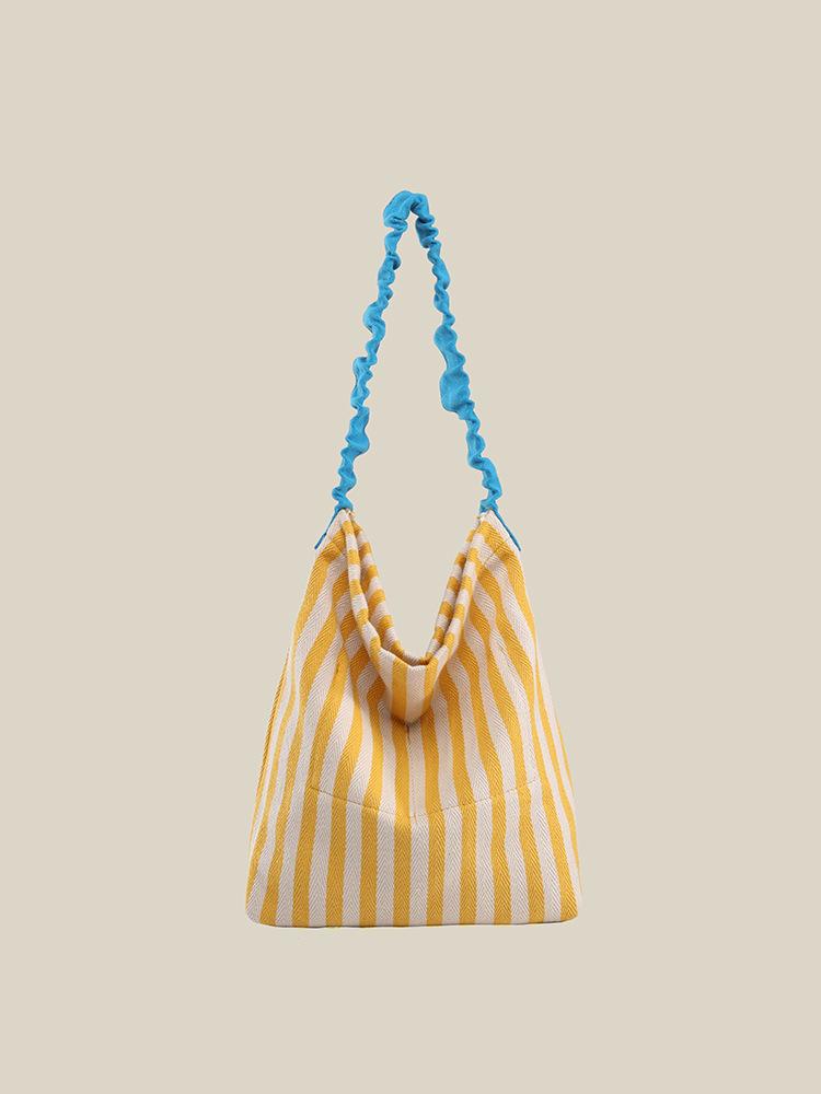 

Small fresh literary and artistic style striped canvas bag women s 2025 new Korean lazy style contrasting color shoulder bag tote bag