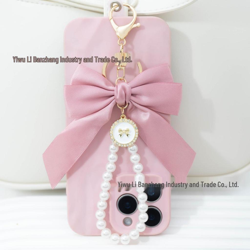Large Bow Faux Pearl Bracelet Keychain with Colored Woven Strap and Alloy Tag Pendant