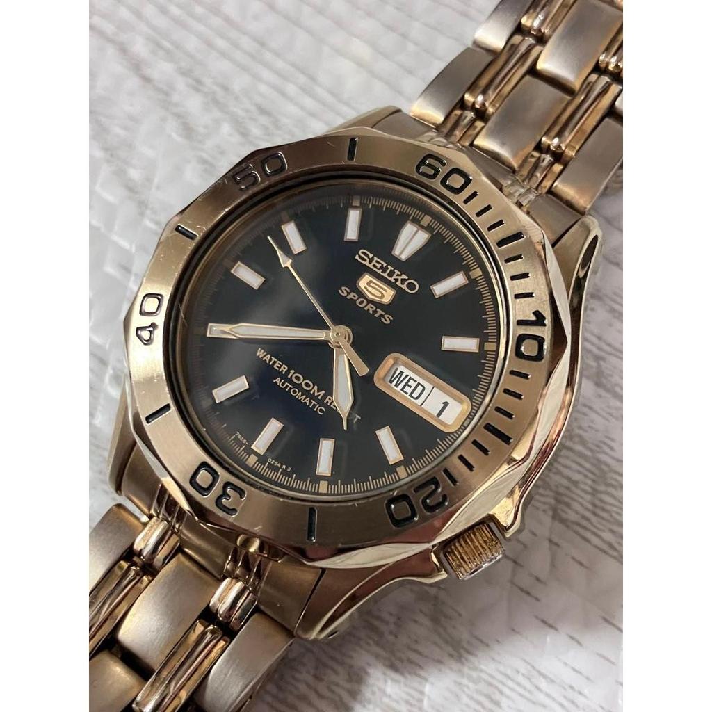 Used SEIKO 5 SPORTS (automatic, exhibition case back) in good working order. (Aftermarket strap).