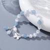 Katzenaugenkristall Schmetterlingsarmband - Designer High-End Damenschmuck in vielseitigem Meerblau Grau