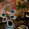 Retro Vintage Rhinestone Geometric Water Drop Necklace: Luxurious, High-End Clavicle Chain with Individualistic, Fashionable Design for Women