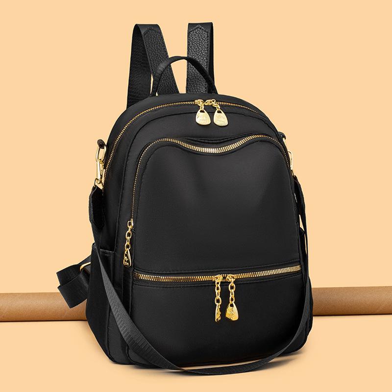 

Рюкзак из ткани Оксфорд для женщин, модный, для поездок на работу, женский рюкзак, повседневный, большой вместимости, легкий дорожный рюкзак one size fits all чёрный